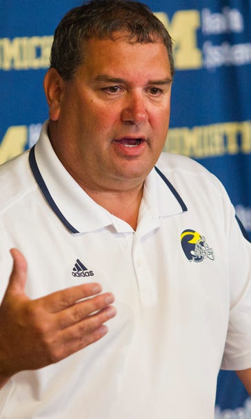 Michigan going back to playing smash-mouth football